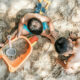 Children playing in the sand on a Bali beach