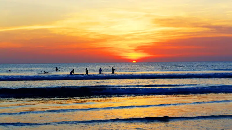 Surfing at Batu Belig Beach