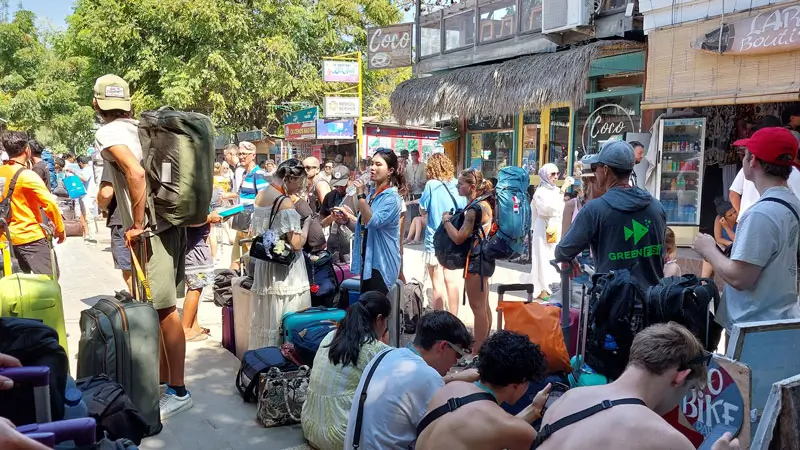 Travelers waiting for boarding a high-speed ferry at Gili Trawangan.