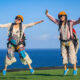 Group of young adults enjoying unforgettable activities in Bali, such as Bali Paragliding Riug Cliff Uluwatu.