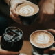 Friends enjoying coffee at a beachside cafe in Tanjung Benoa, Bali