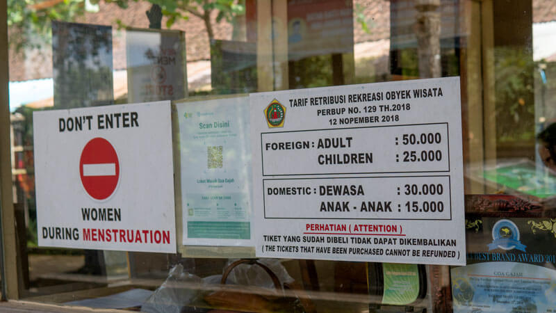 Entrance Fee and Regulations Sign at Goa Gajah Temple