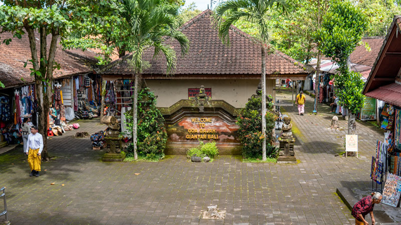 Entrance of Goa Gajah Temple in Gianyar, Bali, with surrounding facilities