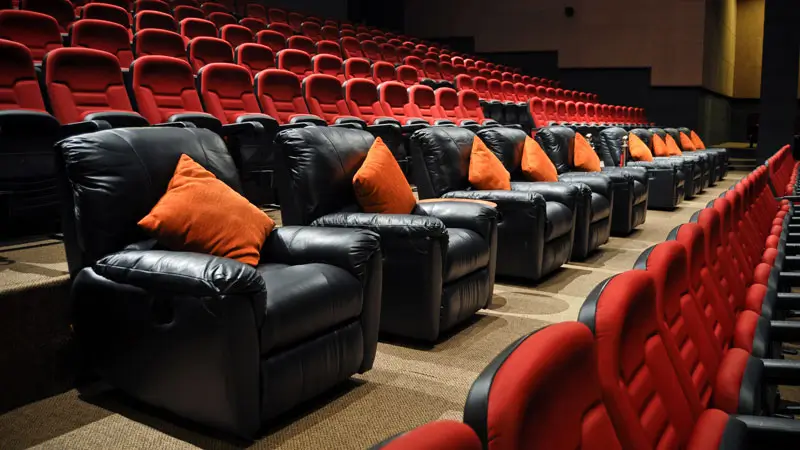 Luxurious VIP seating area at the Bali Nusa Dua Theatre with comfortable recliner seats and pillows. © Devdan Show Bali