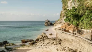 View of Jimbaran Beach with white sand and clear sea water