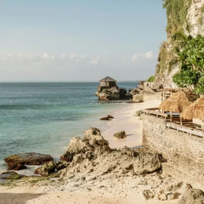 View of Jimbaran Beach with white sand and clear sea water