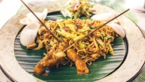 A plate of traditional Indonesian halal food served at a restaurant in Bali.