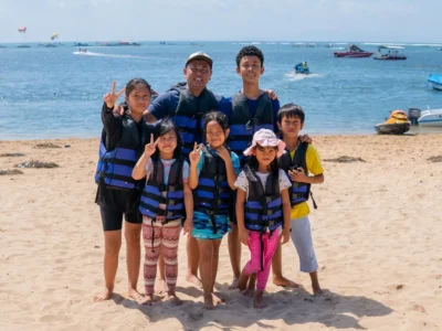 Tourists ready for adventure in Tanjung Benoa with water sports in Bali - Bali Water Sports FAQ